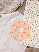 Load image into Gallery viewer, Dresden Plate in peach and floral fabrics
